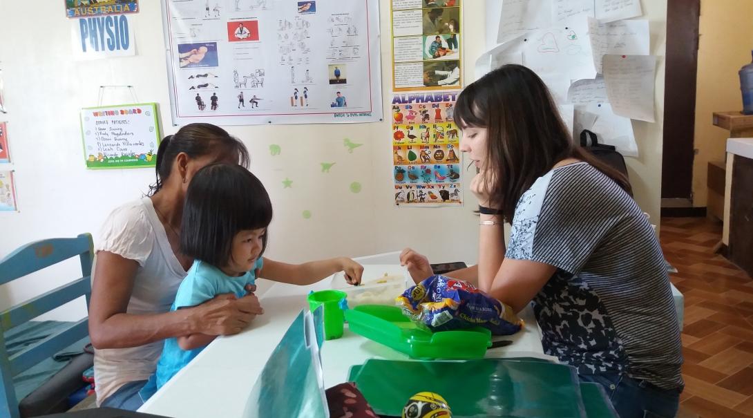 A child during a treatment session at the rehabilitation centre where we will hold our construction challenge in the Philippines A Physiotherapy intern works with a patient at the rehabilitation centre where the Projects Abroad short-term Building Project will take place
